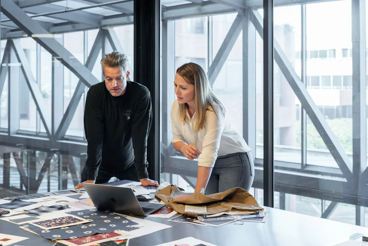 People reviewing drawings during a commercial interior project