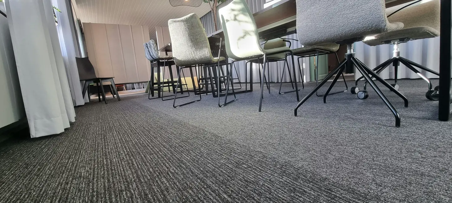 Close view of a commercial floor finish in a workplace interior