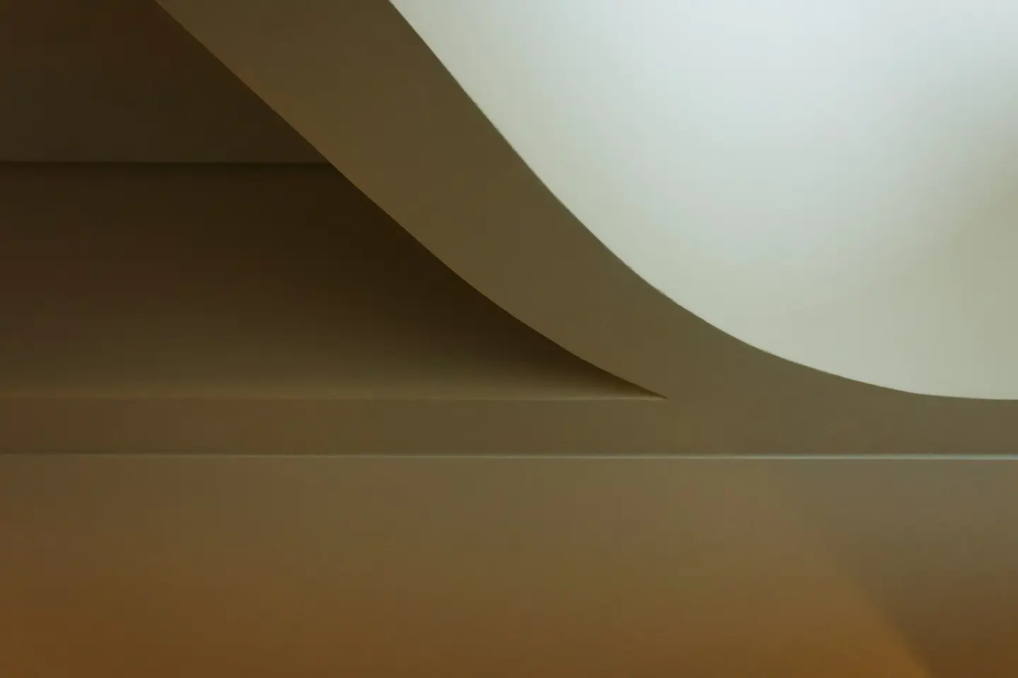 Plain finished wall surface in a controlled interior light