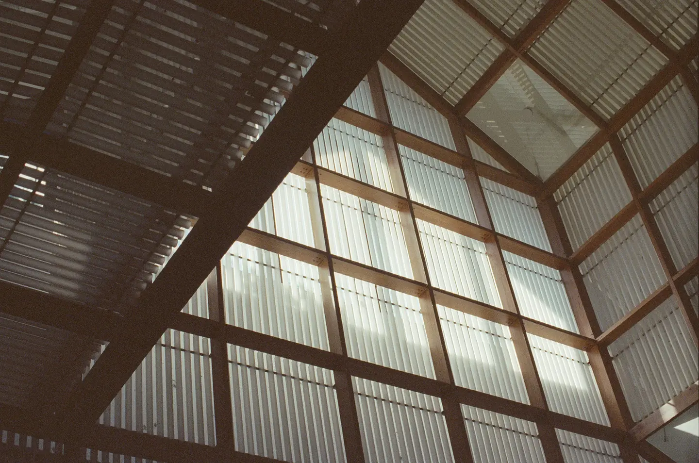 Enclosed meeting room with a table and glazed walls